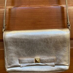 Kate Spade gold metallic crossbody purse